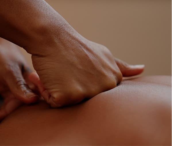 A therapist providing massage care